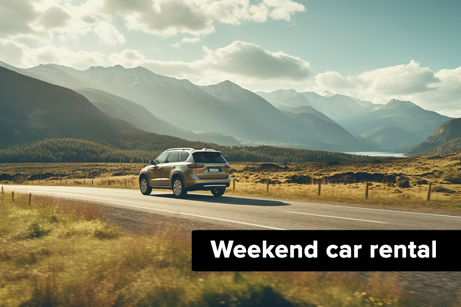 Fair weekend car rental Taggart SUV by a mountain chalet — the ideal weekend rental.